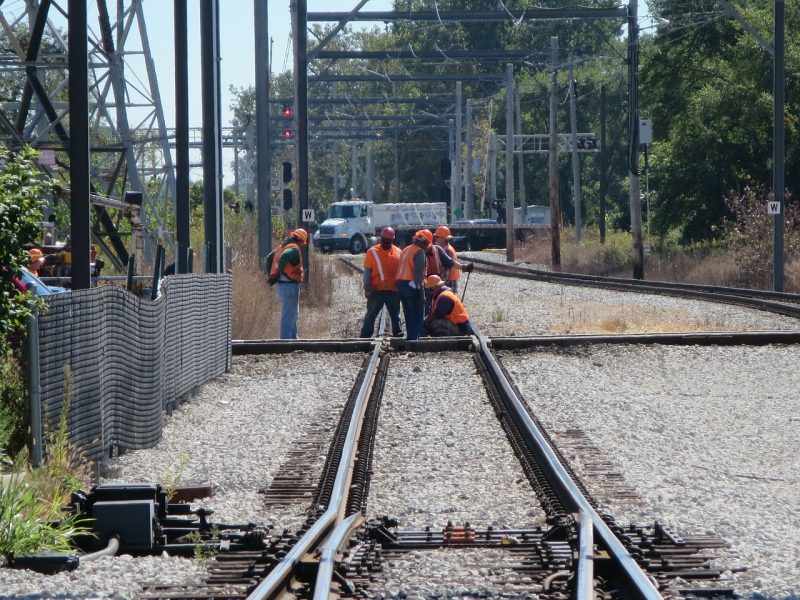 Railroad Workers repairing Tracks Railroad Workers