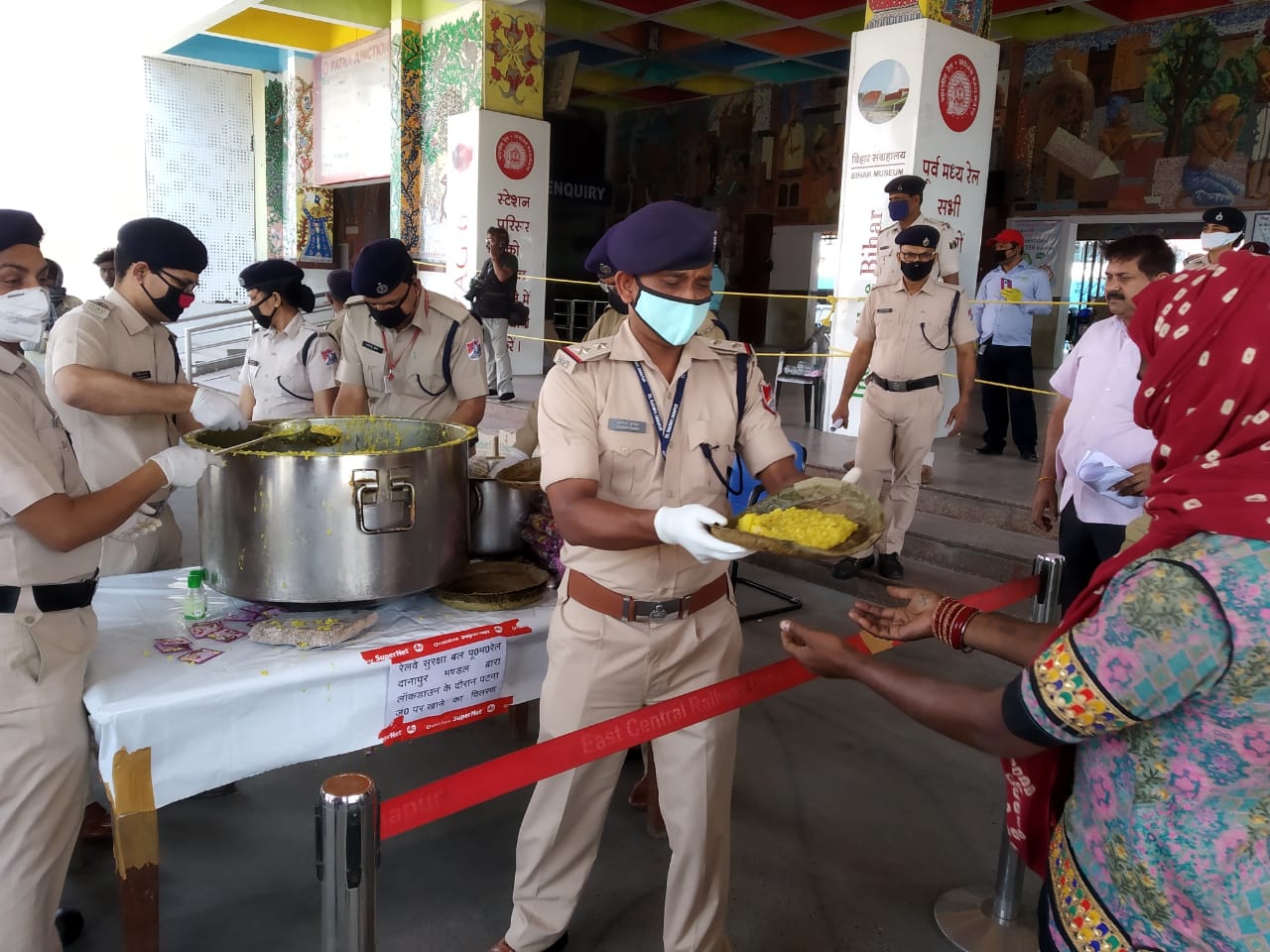 RPF officials providing Food to Poor at Railway Stations